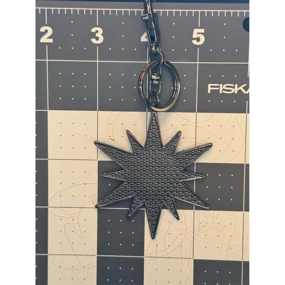 NWOT Express Starburst Glitter Keychain Bag Charm Gunmetal Silver Star Gift